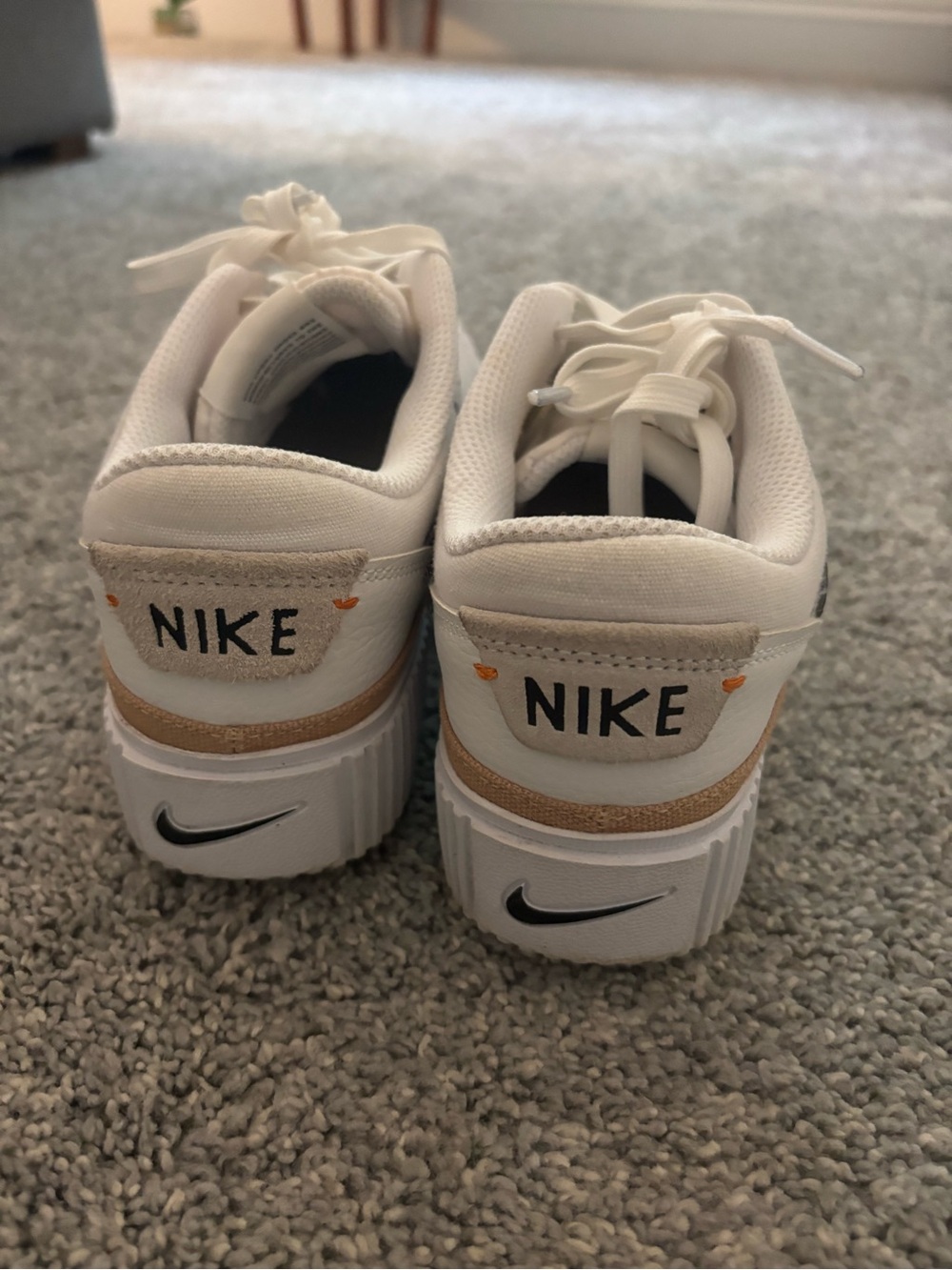 Nike White Sneakers with Black Swoosh and Tan Trim - Picture 3 of 4